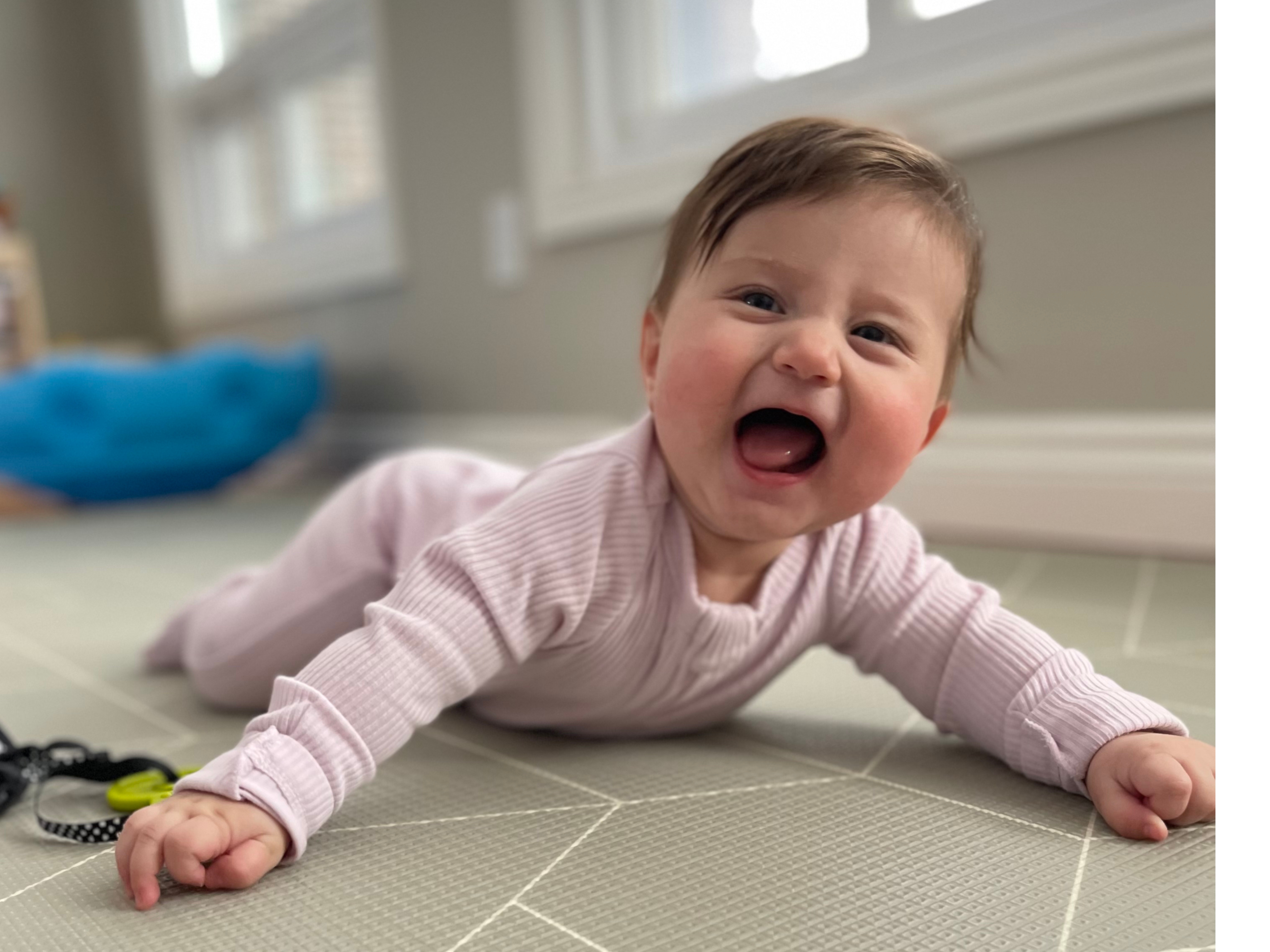 Baby in physiotherapy session showing in-home pediatric care